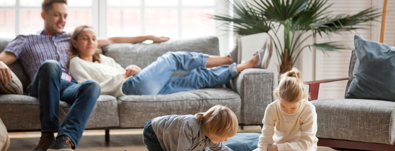 A family hanging out in their living room